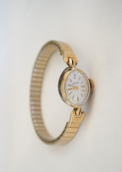 Dainty Gold Girald Perregaux Watch