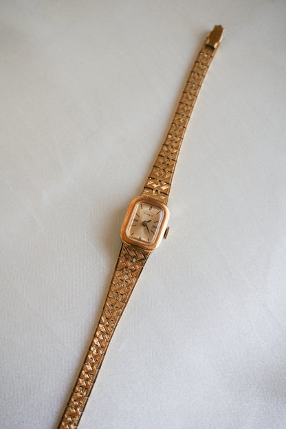 Gold Timex Watch